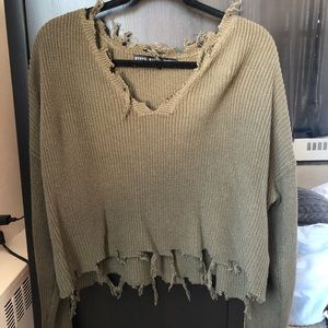 Destructed crop sweater in a deep sage color
